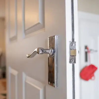 Electrician installing sockets and switches in a North London property
