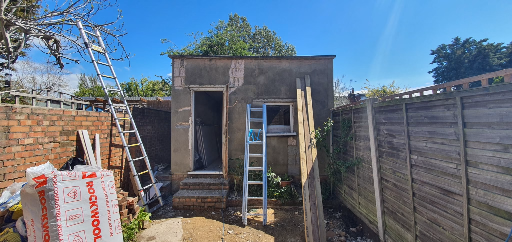 Garage before conversion in North London by Fixiz