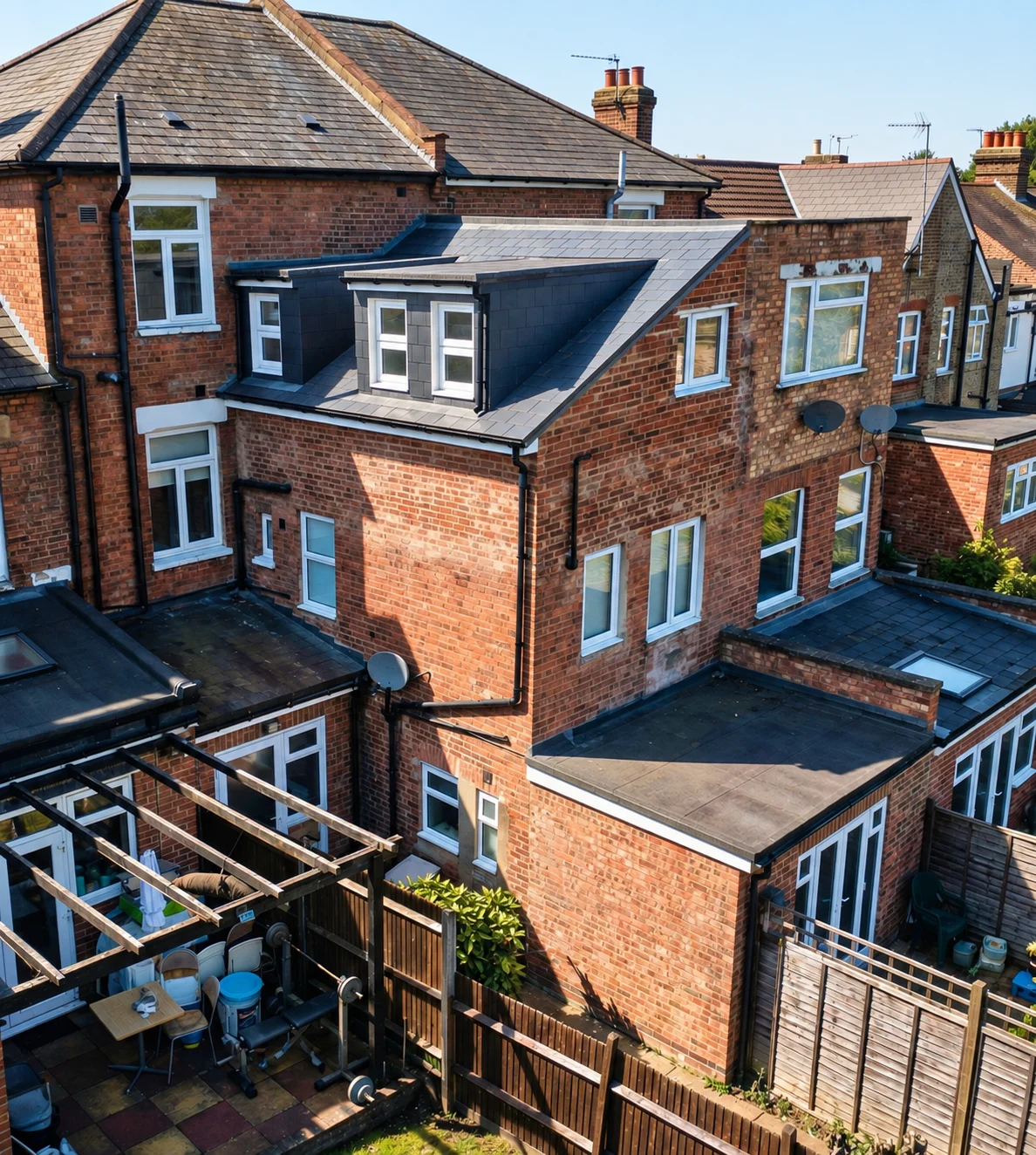 Completed double rear extension with slate roof and new windows in Friern Barnet, N11 3ER